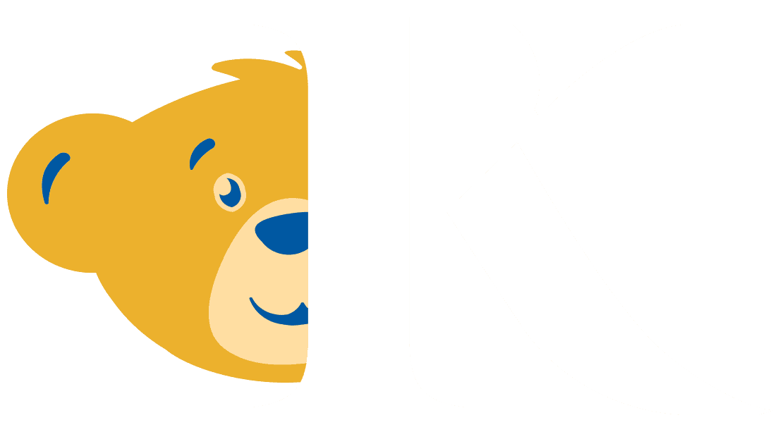 The Build-A-Bear mascot peeking out from behind the Known logo